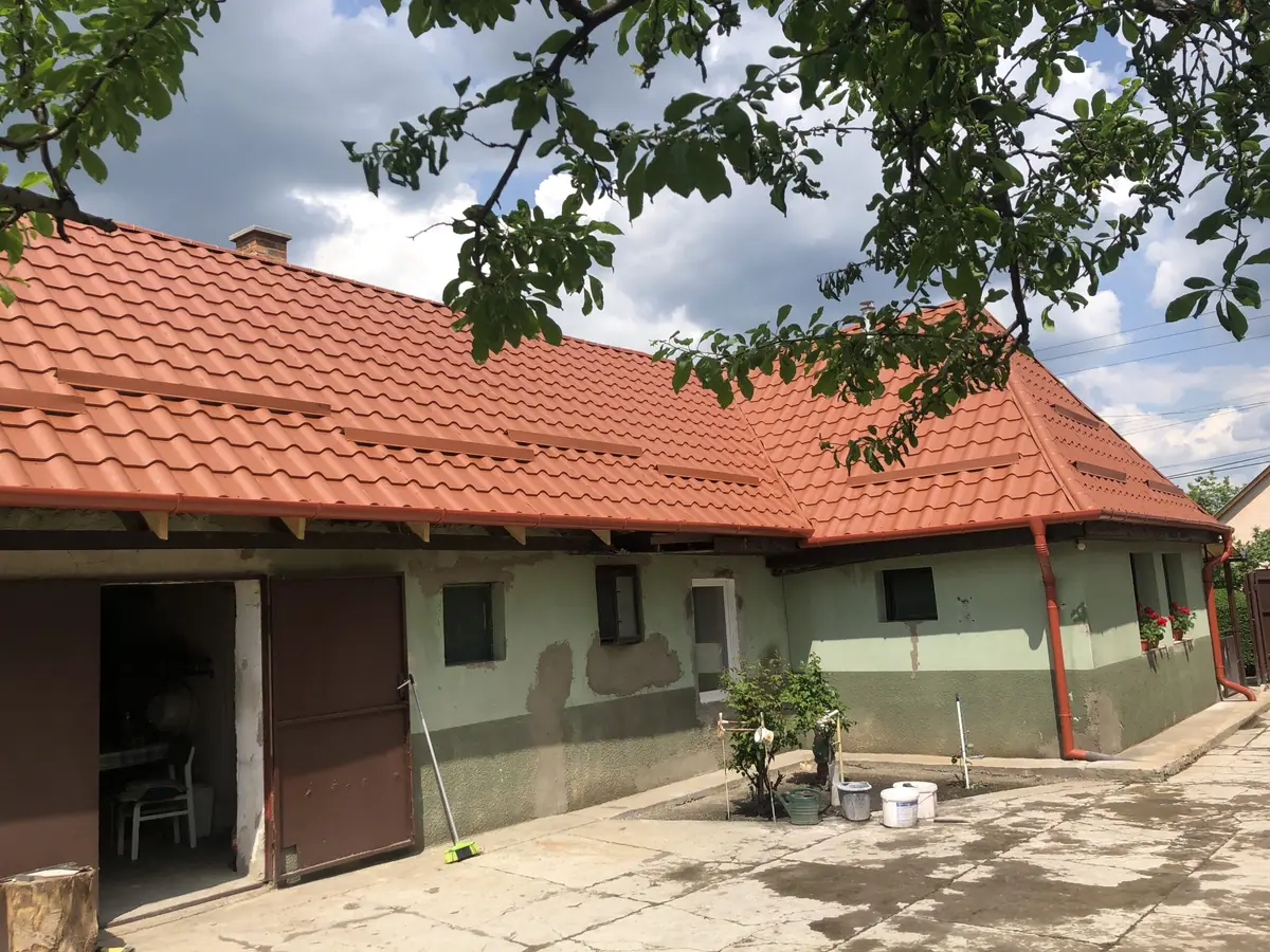 Einfamilienhaus – Pfannenblech-Dachdeckung